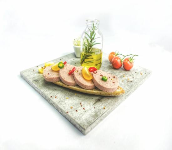 Home cook working with pizza dough on kitchen counter